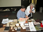 Charles_Taws_curator_and_Kelly_Love_with_Kydd_trunk_contents_A.jpg